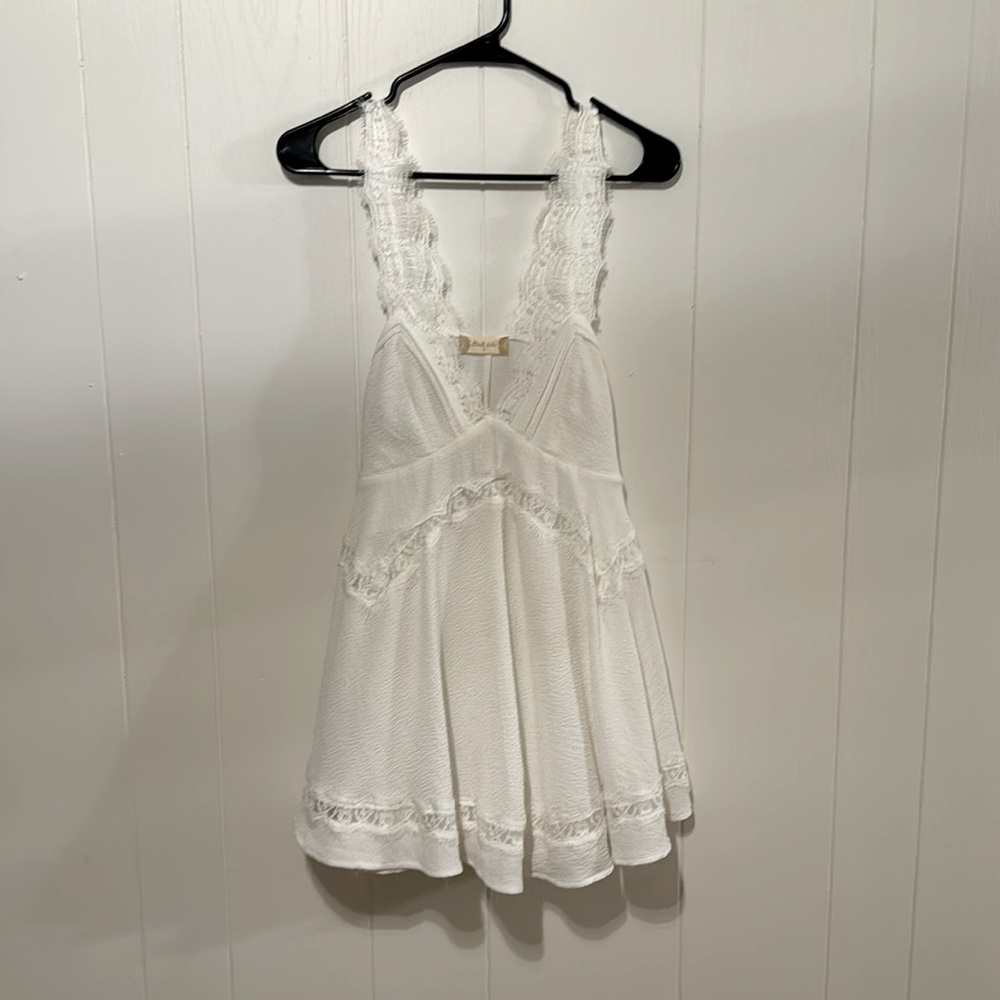 Short white altar’d state dress with lace